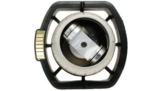 Top view of the Tilt Stage mounted in the black Phenom sample-holder frame, showing the central cylindrical tilt mechanism.