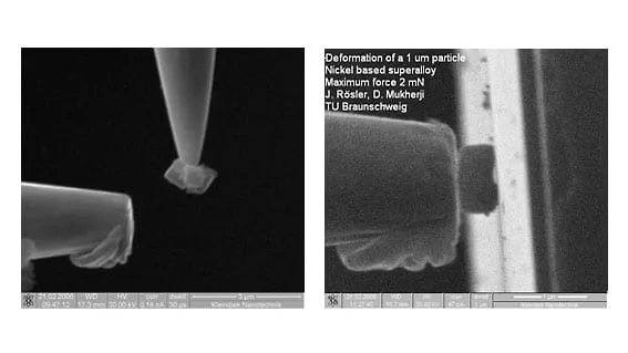 Two SEM images of an FMS tip pressing into a 1 µm nickel-based superalloy particle, deforming it under load.